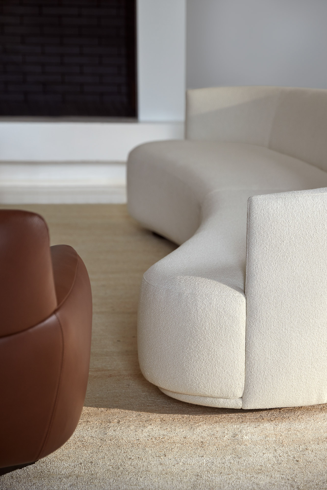 Flow curved sofa system designed by Mario Ruiz for Joquer