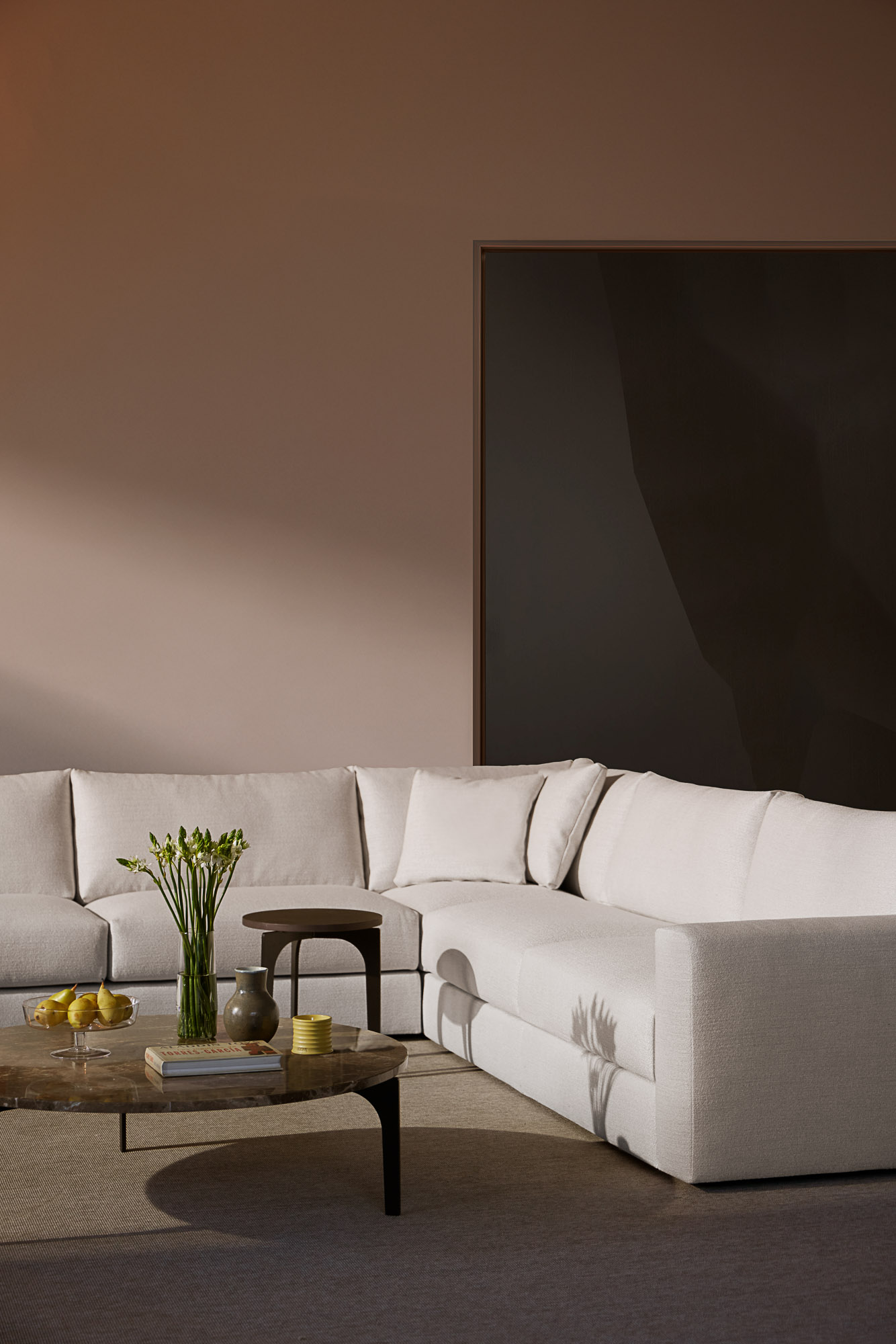 Front sofa system and Padi coffee tables by Mario Ruiz for Joquer