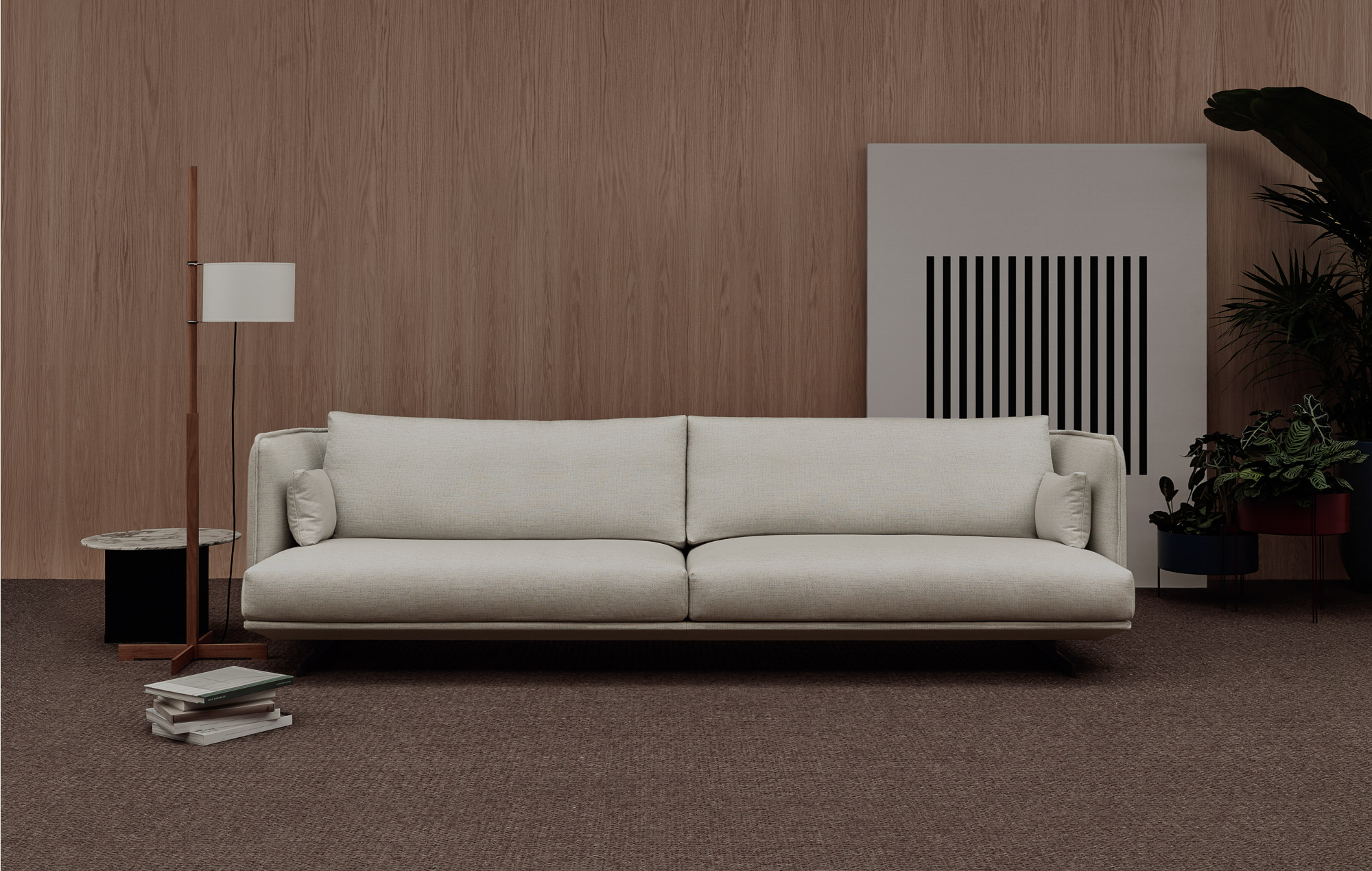 Serene elevated base sofa designed by Mario Ruiz for Joquer