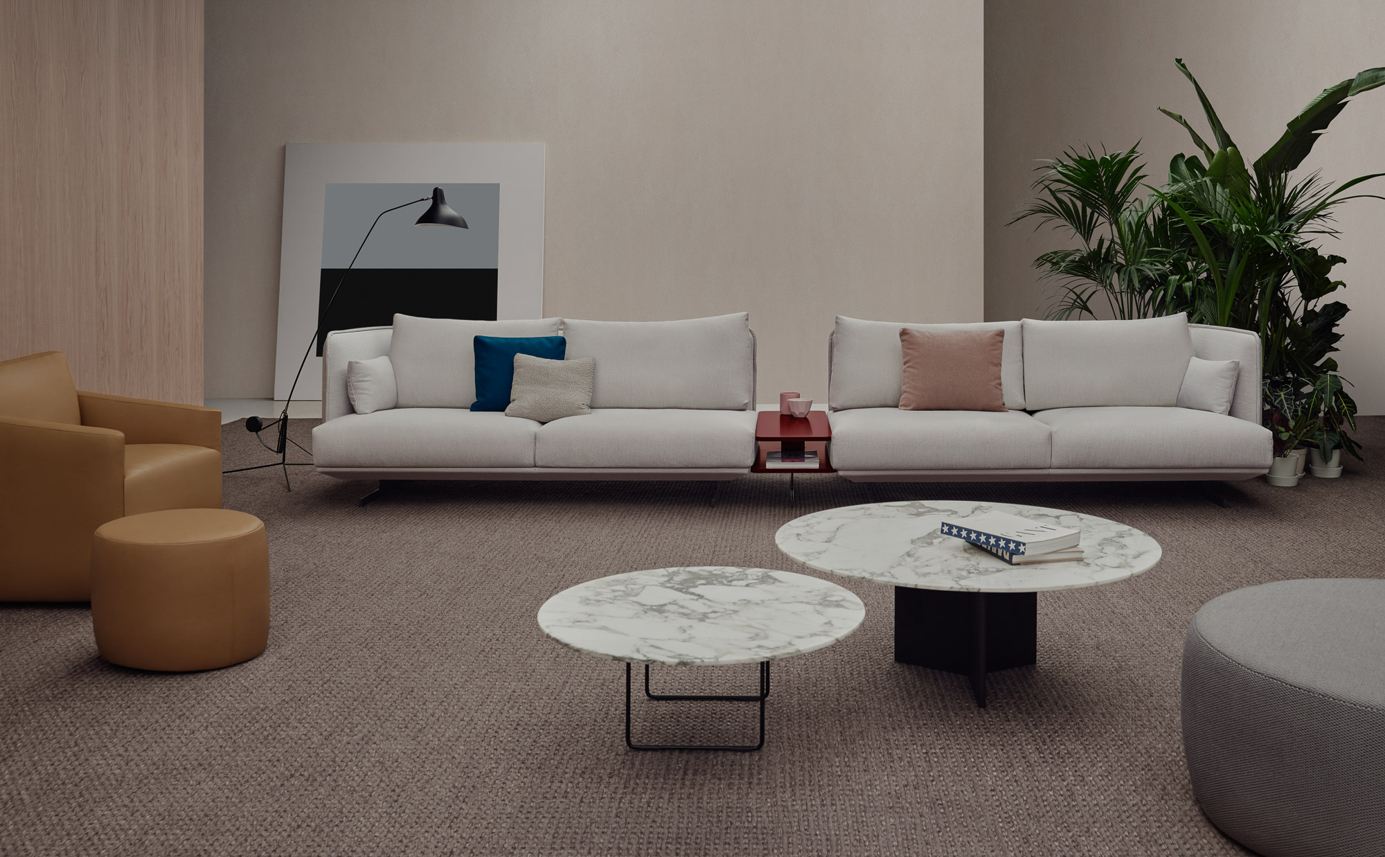 Serene sofa system, Depart ottomans, and Venice Contract lounge chair designed by Mario Ruiz for Joquer