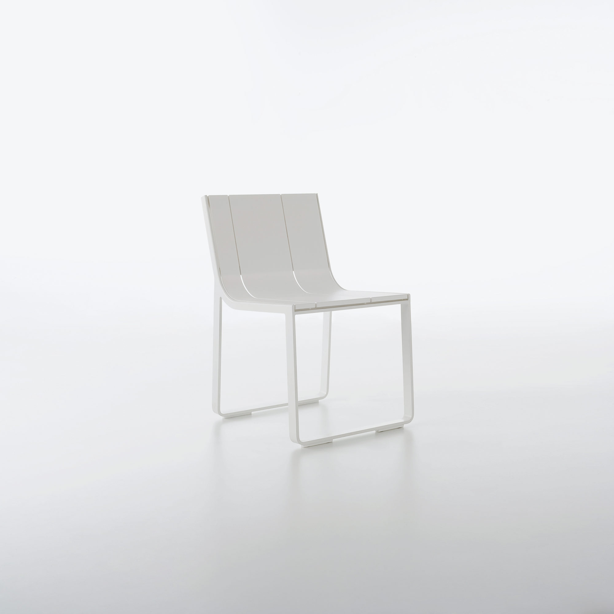Flat dining chairs designed by Mario Ruiz for Gandia Blasco